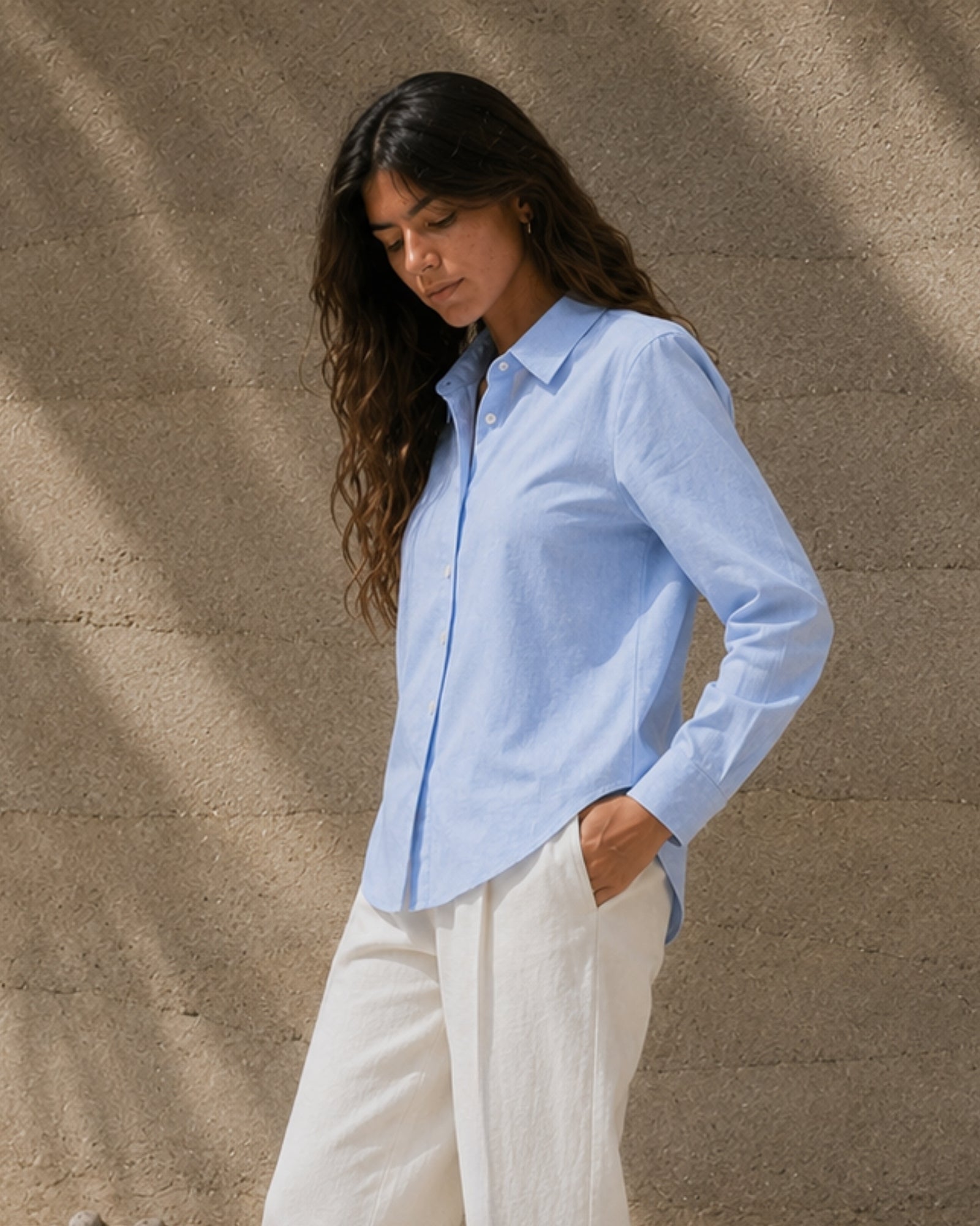 Regular Fit Linen Shirt in Light Blue, lifestyle view 2, showing collar, hem and relaxed tailoring