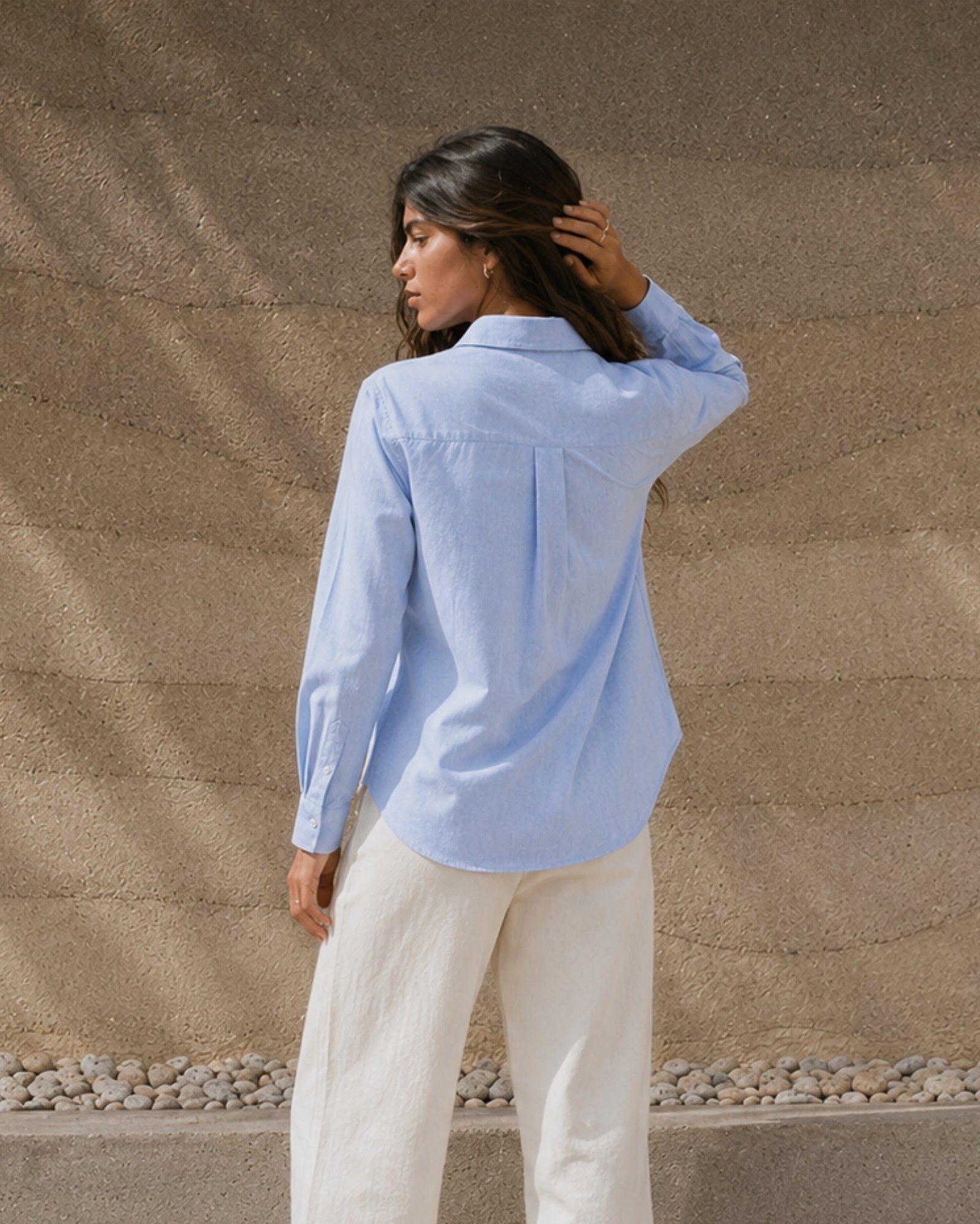 Regular Fit Linen Shirt in Light Blue, lifestyle view 4, showing collar, hem and relaxed tailoring