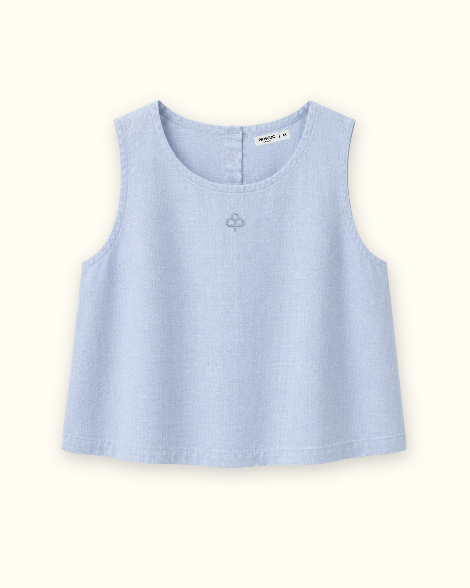 Top in lino senza maniche azzurro, vista frontale, con scollo e linea senza maniche