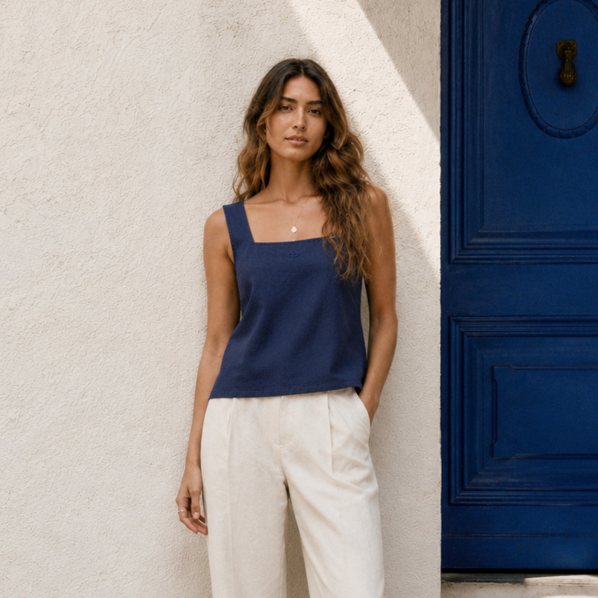 Square Neck Linen Top in Navy Blue, lifestyle view 1, showing neckline and sleeveless shape
