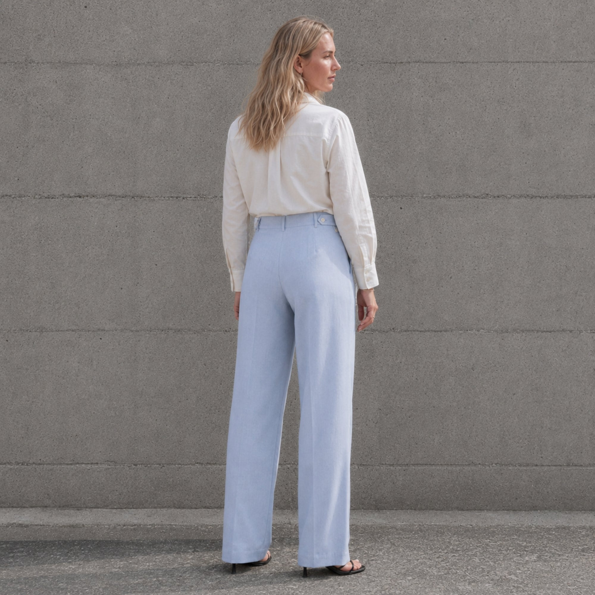 Straight Leg Linen Pants in Light Blue, lifestyle view 4, showing pleats and straight leg shape