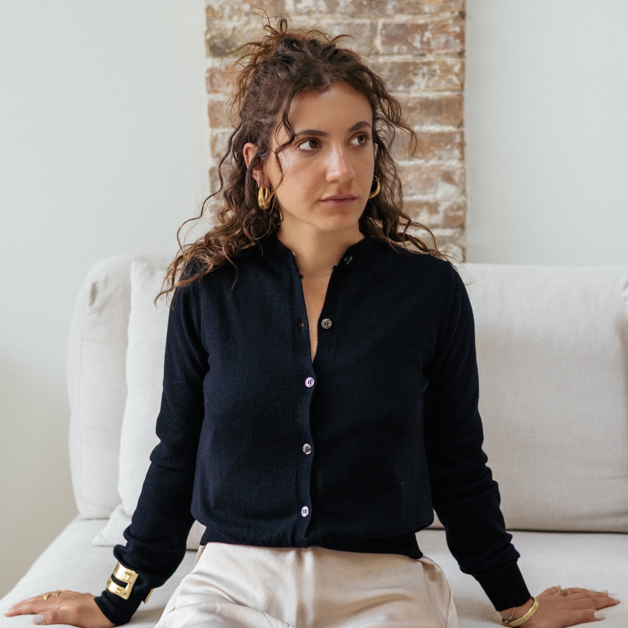 Extra fine merino wool cardigan in Black - view 1 - Pamuuc