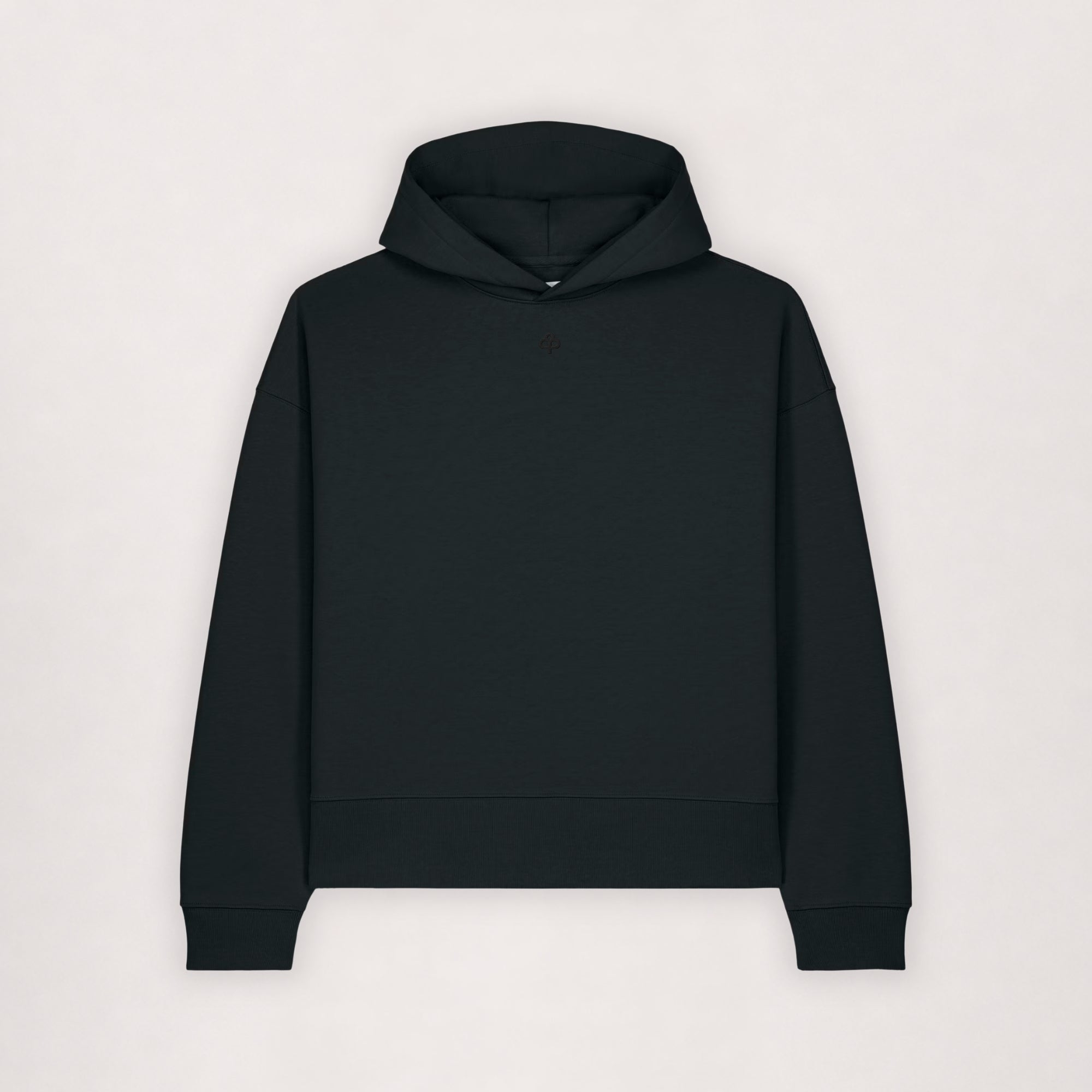 Oversize cotton hoodie in black, flat lay front view with ribbed hem