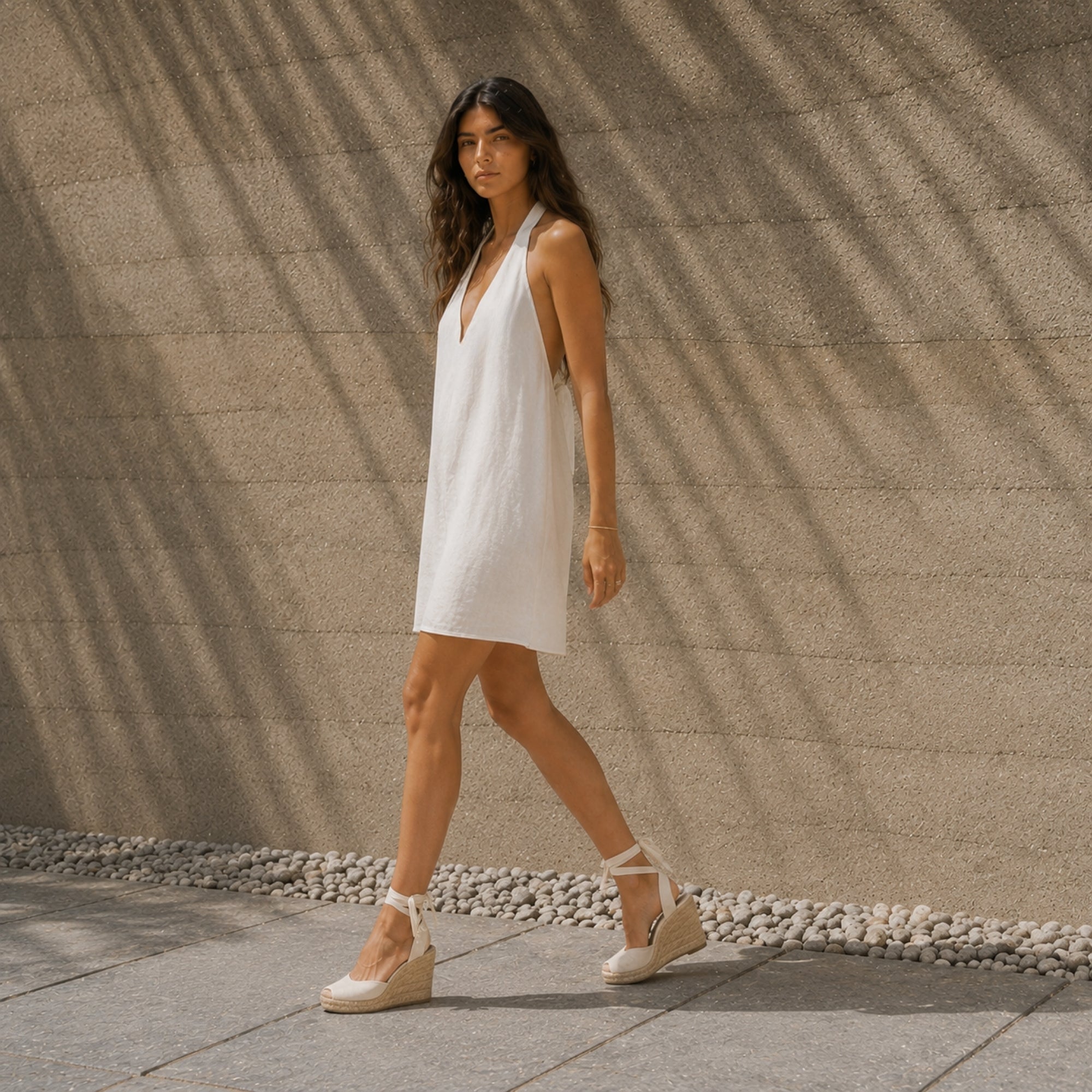 Linen Halter Dress in Off White, lifestyle view 3, showing neckline and dress silhouette