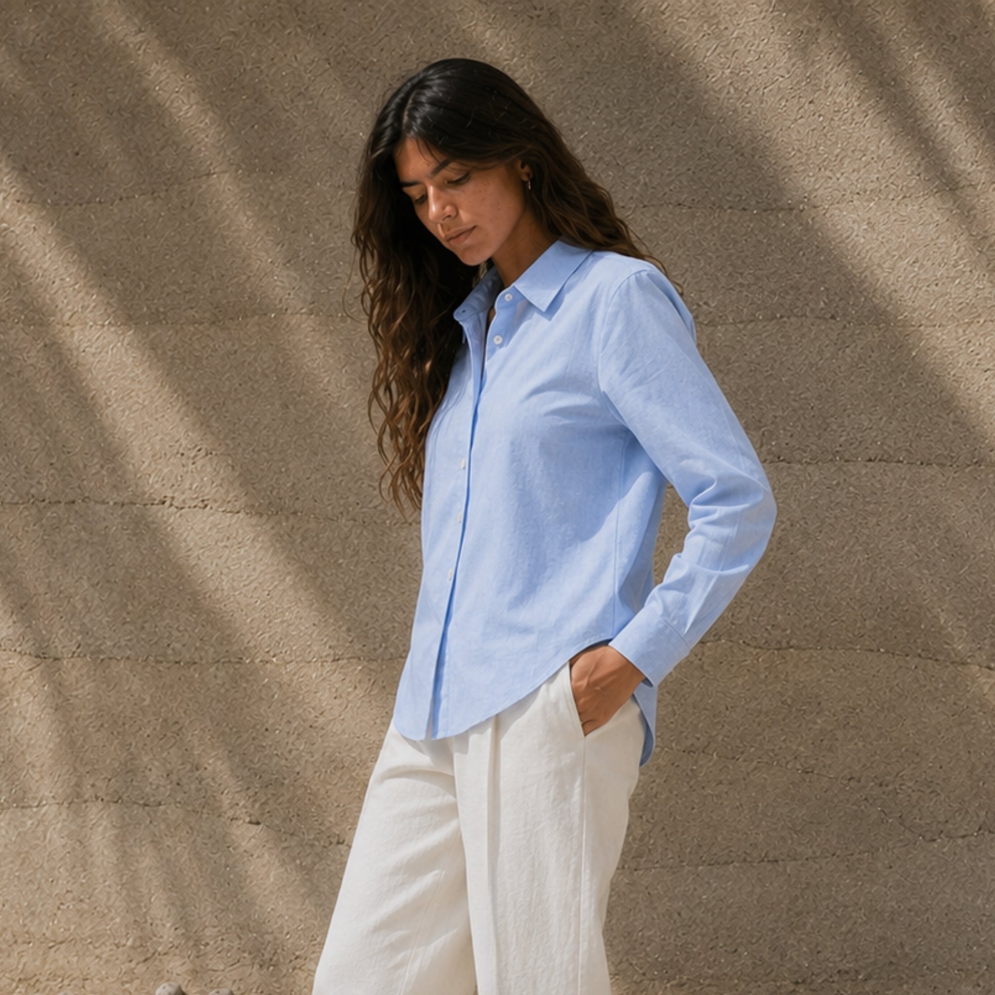 Regular Fit Linen Shirt in Light Blue, lifestyle view 2, showing collar, hem and relaxed tailoring