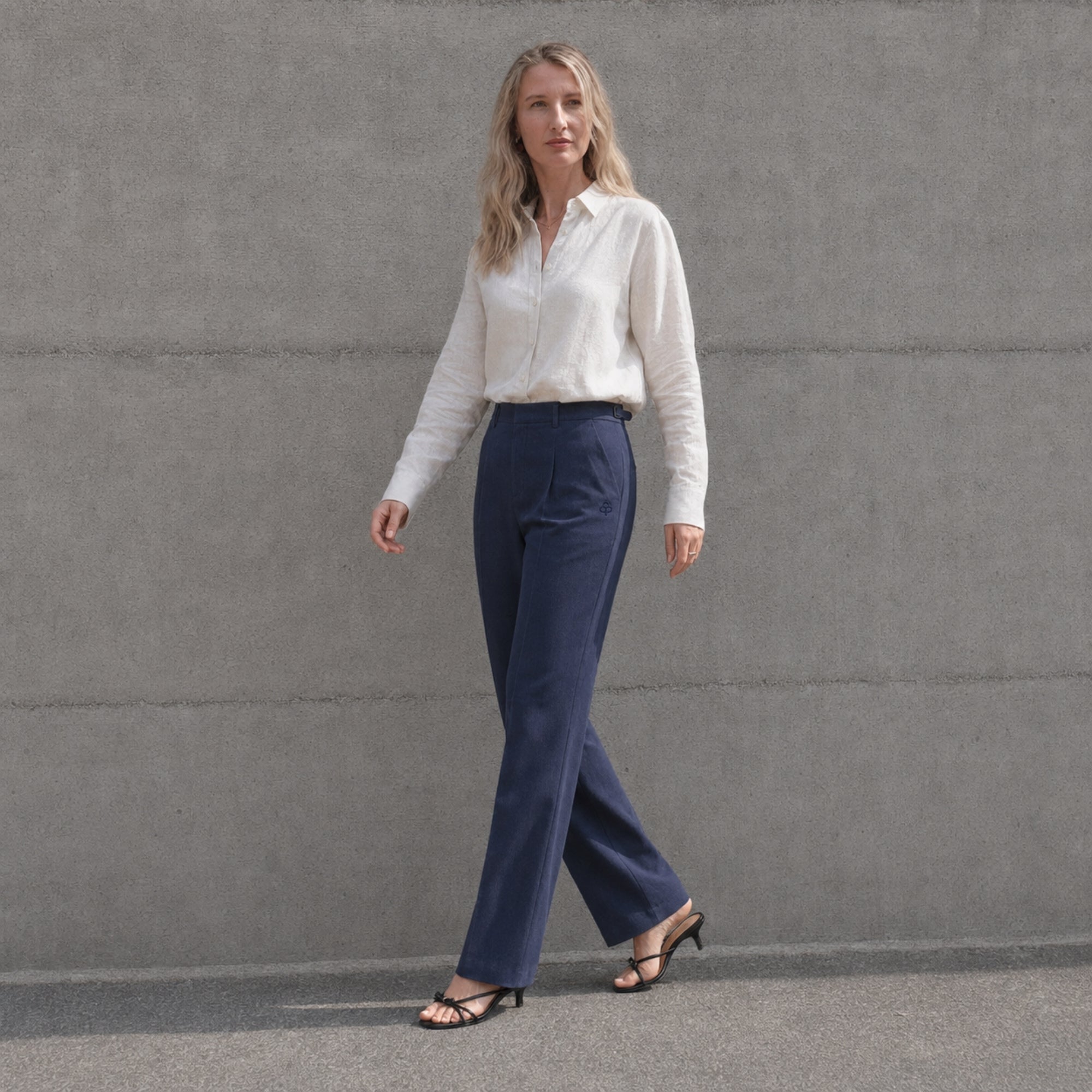 Straight Leg Linen Pants in Navy Blue, lifestyle view 3, showing pleats and straight leg shape