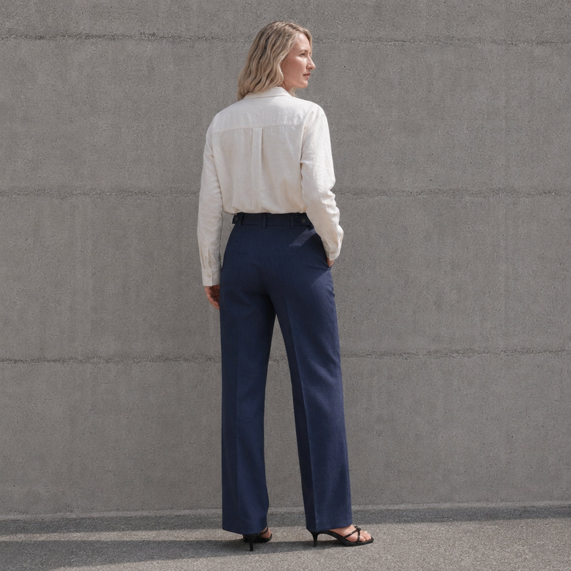 Straight Leg Linen Pants in Navy Blue, lifestyle view 4, showing pleats and straight leg shape