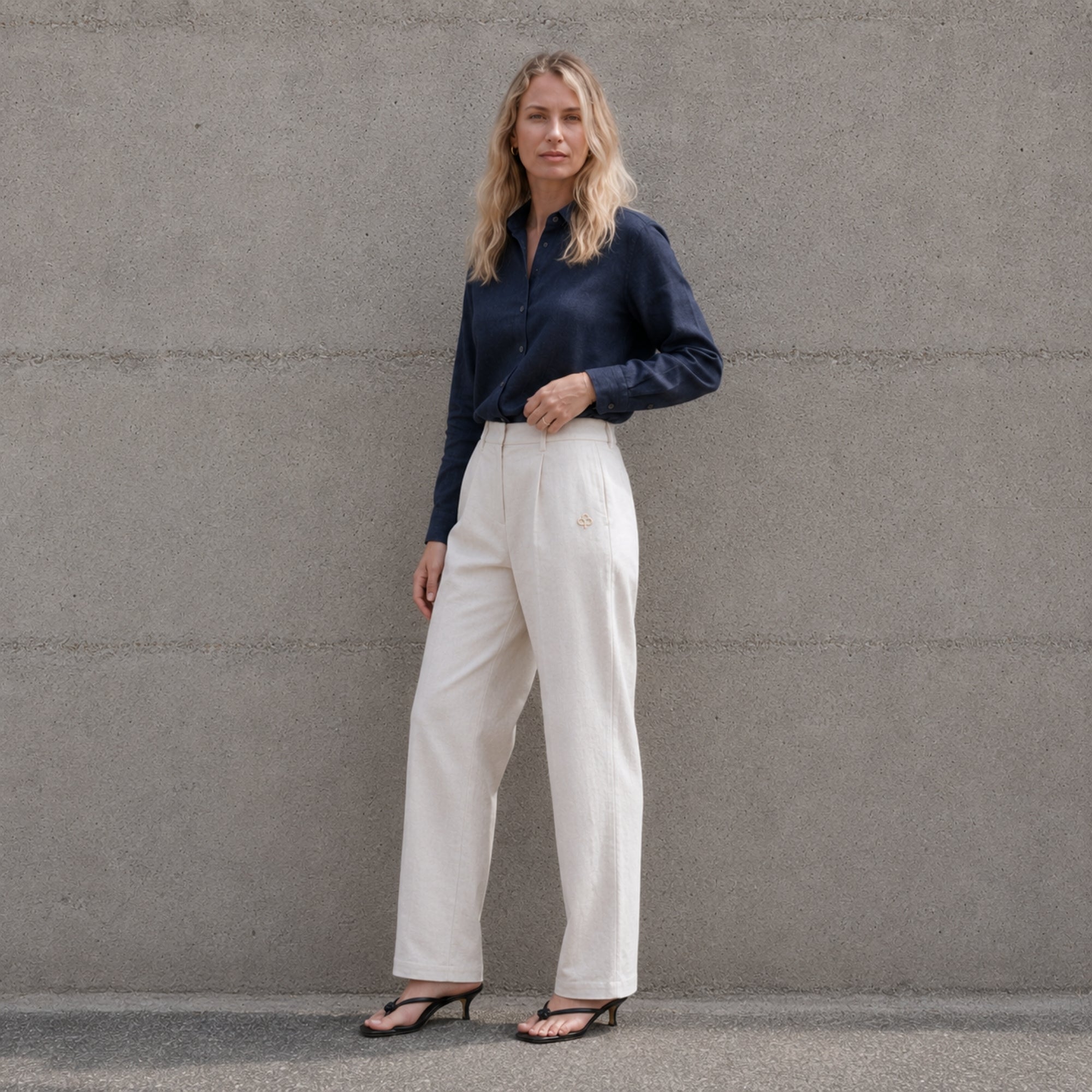 Straight Leg Linen Pants in Off White, lifestyle view 2, showing pleats and straight leg shape